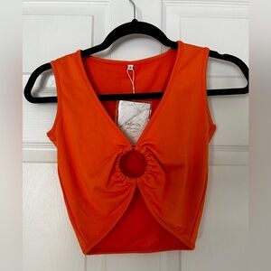 Cute orange crop top. Perfect for summer